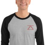 Model wearing a grey and black 3/4 sleeve raglan shirt with the zSecurity logo on the chest, perfect for casual and professional settings.