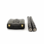 A close-up view of the Alfa AWUS036ACH USB wireless adapter and its two detachable 5dBi antennas, highlighting the antenna ports and compact design for wireless network testing.